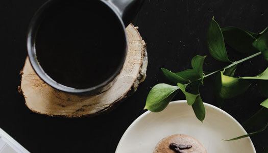 Cozy interior of Buon Cibo Italian Cafe with warm lighting